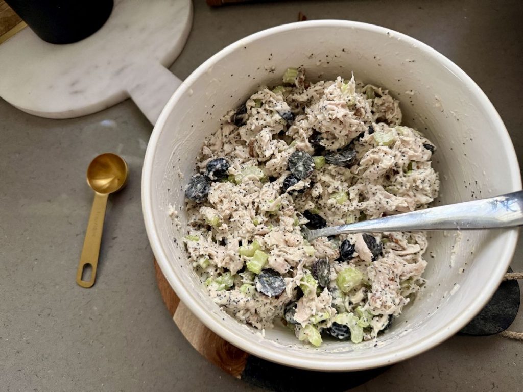 If you're looking for the best chicken salad recipe, look no further than my Aunt Tina's. It's a take on a Sonoma chicken salad, with a tangy & sweet dressing and lots of texture--absolutely perfect!  How to make Sonoma chicken salad, an easy chicken salad for barbecues, potlucks, and summer nights when it's too hot to cook. 