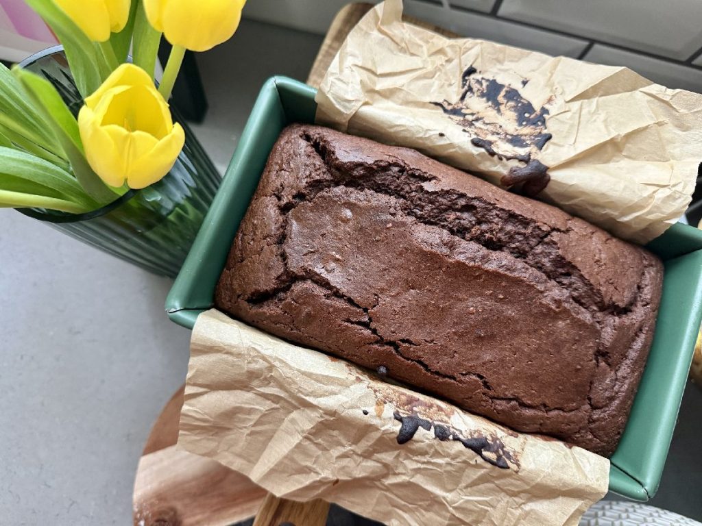This double chocolate zucchini bread is easy, delicious, and surprisingly healthy.  It's the perfect way to use up all that late summer zucchini, and makes a healthy dessert or afternoon treat.  