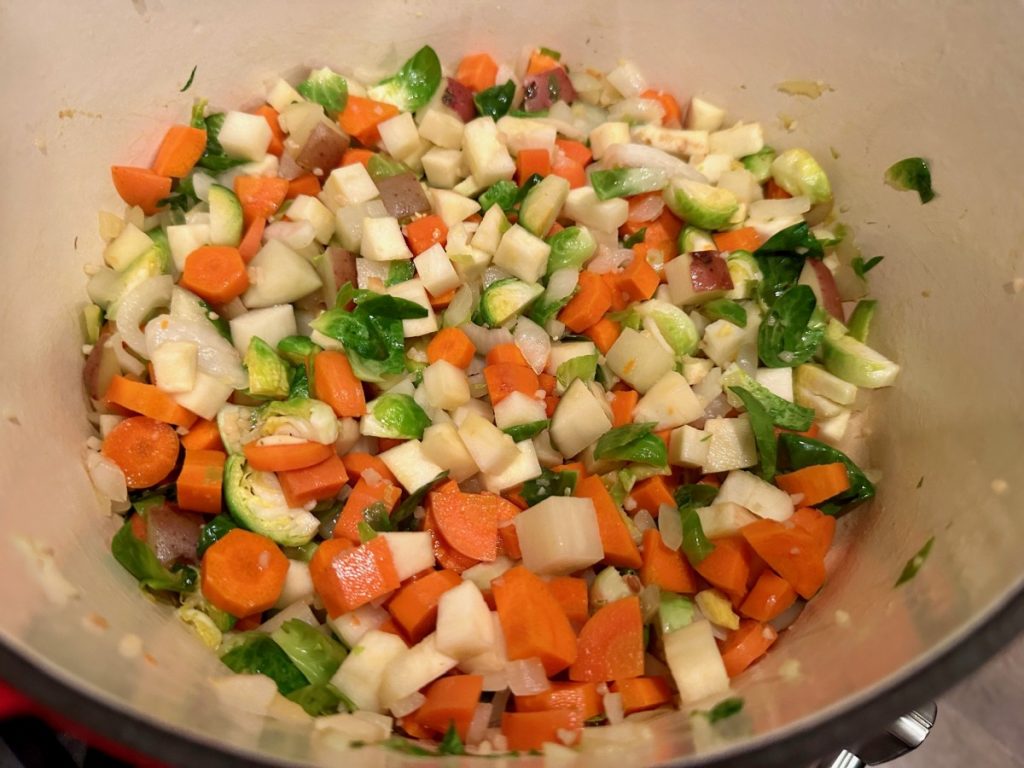 A Delicious Twist on Shepherd's Pie with Carrot, Parsnip, & Goat Cheese Mash - the filling is packed with brussels, carrots, and parsnips