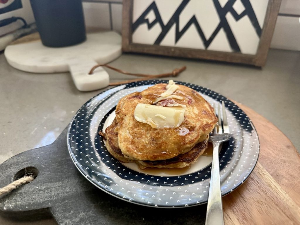These strawberry cornmeal pancakes are the perfect summer brunch recipe...fresh summer strawberries in a golden crispy cornmeal pancake, drenched in maple syrup. 