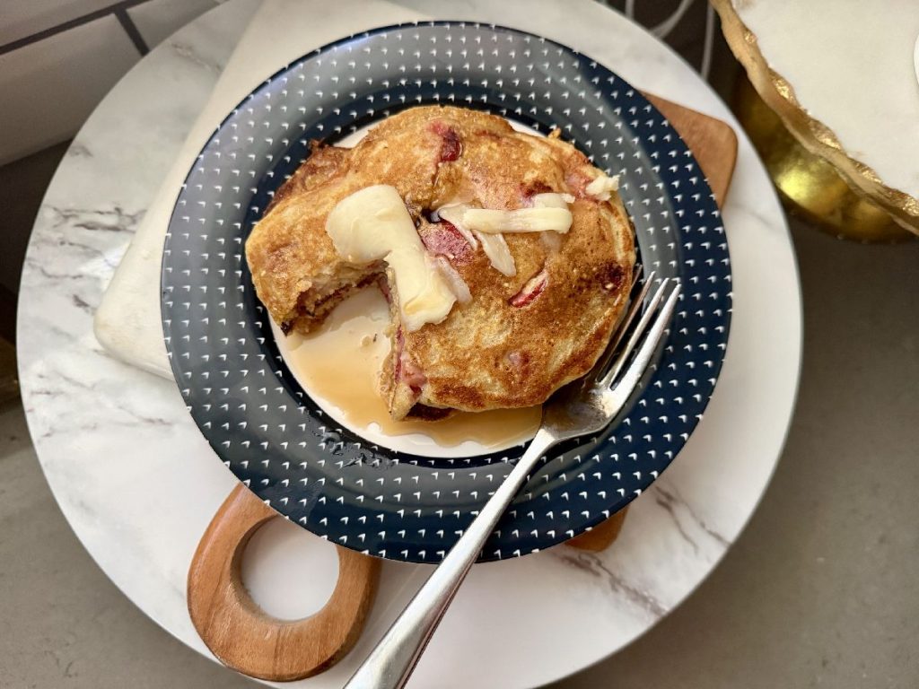 These strawberry cornmeal pancakes are the perfect summer brunch recipe...fresh summer strawberries in a golden crispy cornmeal pancake, drenched in maple syrup. 