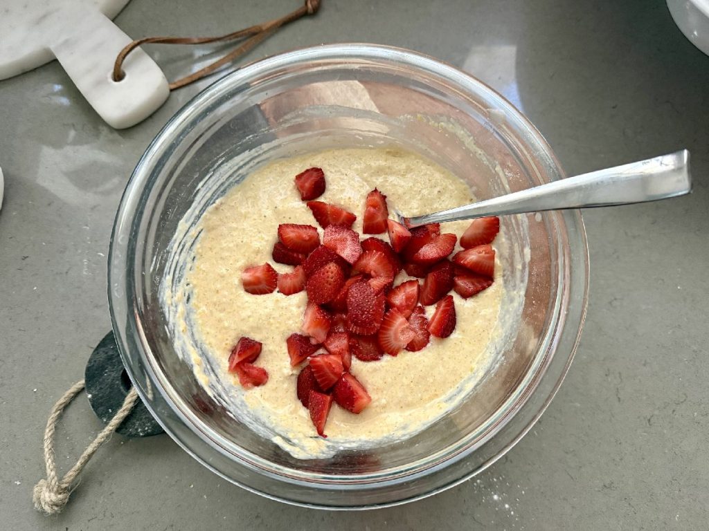 These strawberry cornmeal pancakes are the perfect summer brunch recipe...fresh summer strawberries in a golden crispy cornmeal pancake, drenched in maple syrup. 