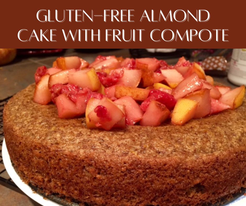 This delicious gluten-free almond cake is packed with spice & orange zest, & topped with a tart fruit compote, an easy GF dessert that even the gluten-eaters will love!