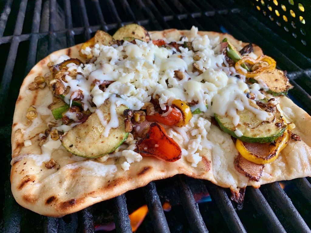 How to Grill Pizza...Techniques & Tips for the Best Grilled Pizza | I share two easy techniques for grilling pizza dough (including my easy go-to dough recipe) plus the tools I use and several awesome pizza recipe ideas. This is such a great summertime dinner recipe, and easier than you'd think! How to make grilled pizza. #pizza #grill #pizzadough #grilledpizza