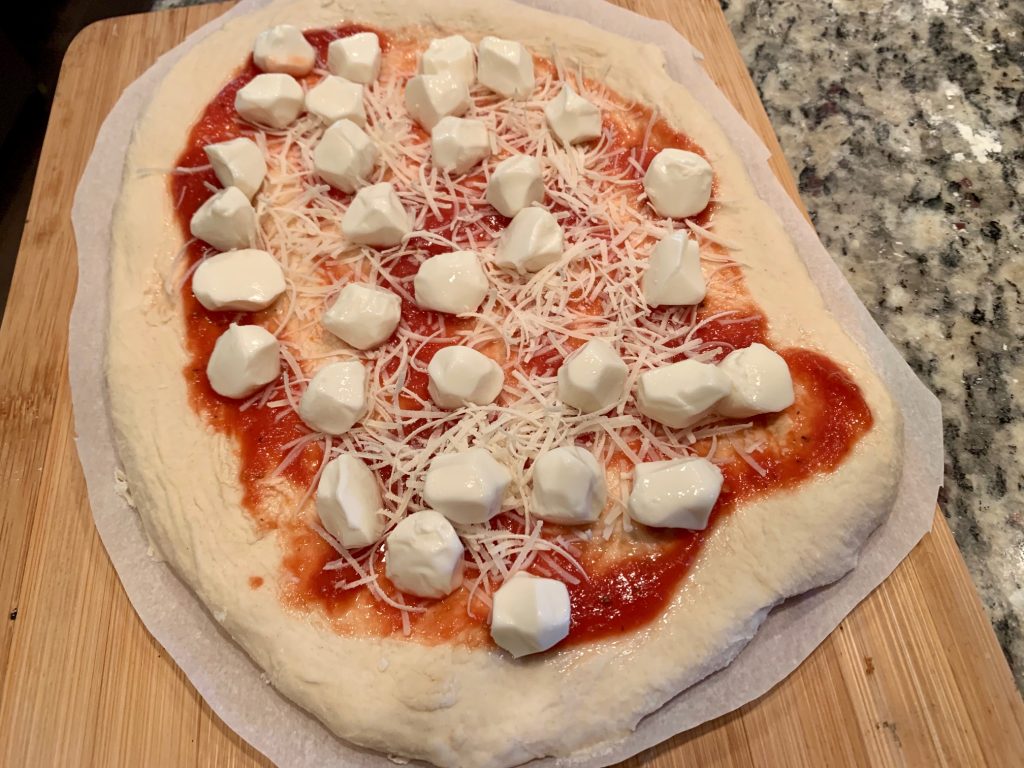 This is the best grilled pizza dough recipe, great with any toppings
