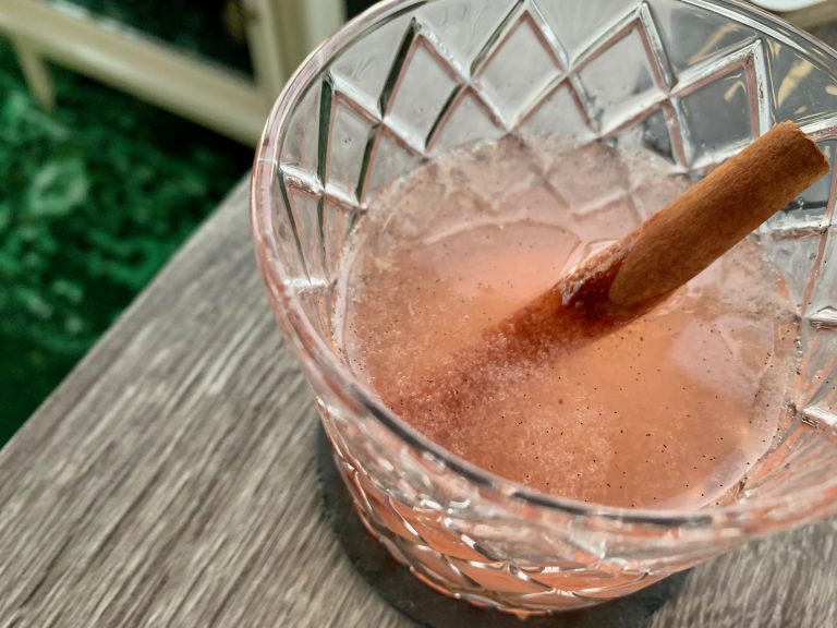 A Different Take on Poinsettia Punch (Berry, Lemon, & Spice Gin Cocktail)