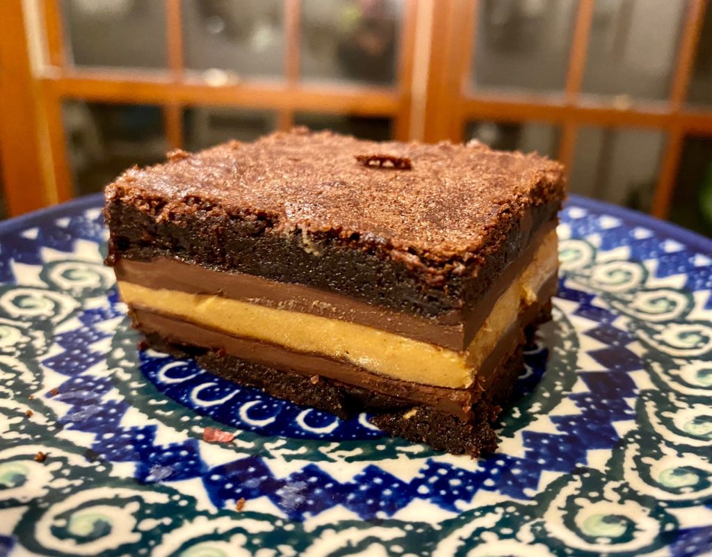 Double Chocolate Peanut Butter Brownies | These delicious layered peanut butter brownies are a fun twist on buckeye brownies, a perfect indulgent dessert. 