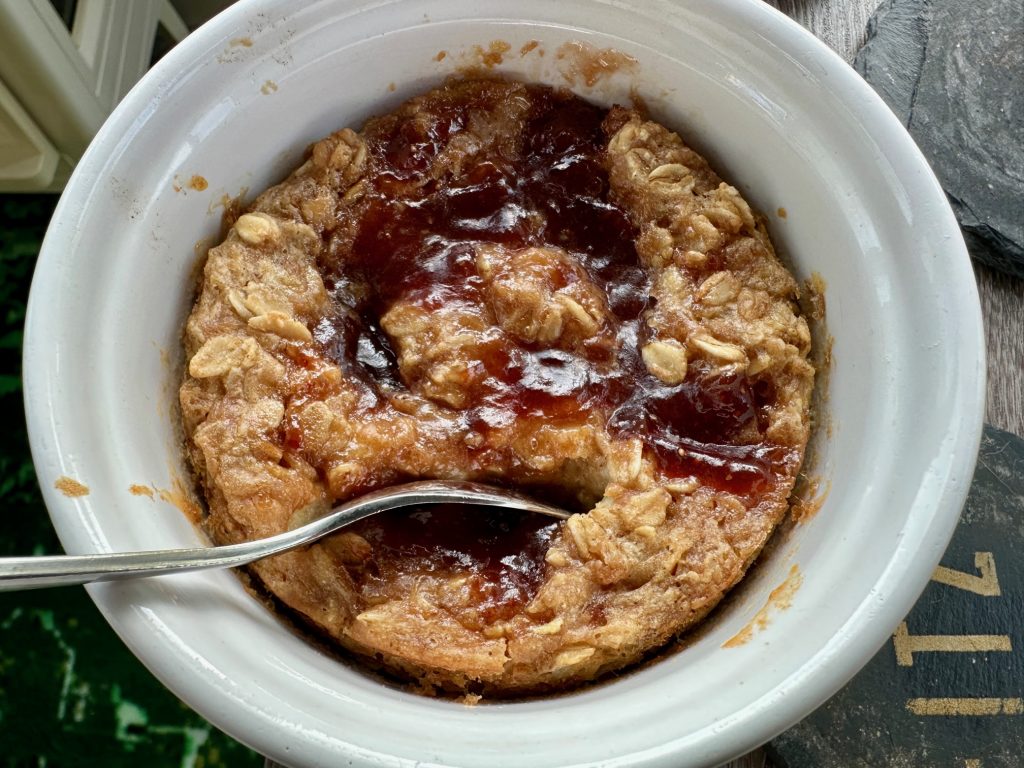 Easy & Delicious PB&J Baked Oatmeal | This quick peanut butter and jelly baked oatmeal is a healthy (yet indulgent-feeling) treat that's perfect for breakfast or any time of day! 