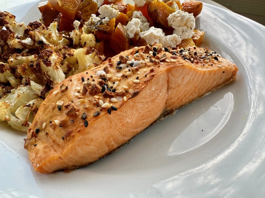 How to Cook Frozen Salmon in the Air Fryer | It is super easy to make air fryer frozen salmon, & it makes a fast, healthy, & delicious dinner any night of the week! This is a go-to meal for me, with endless varieties of spices & side dishes. 