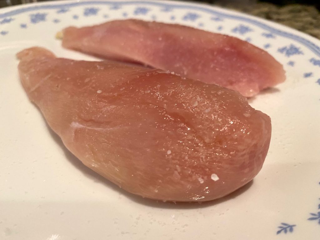 raw chicken tenders getting a dry bring before going in the air fryer