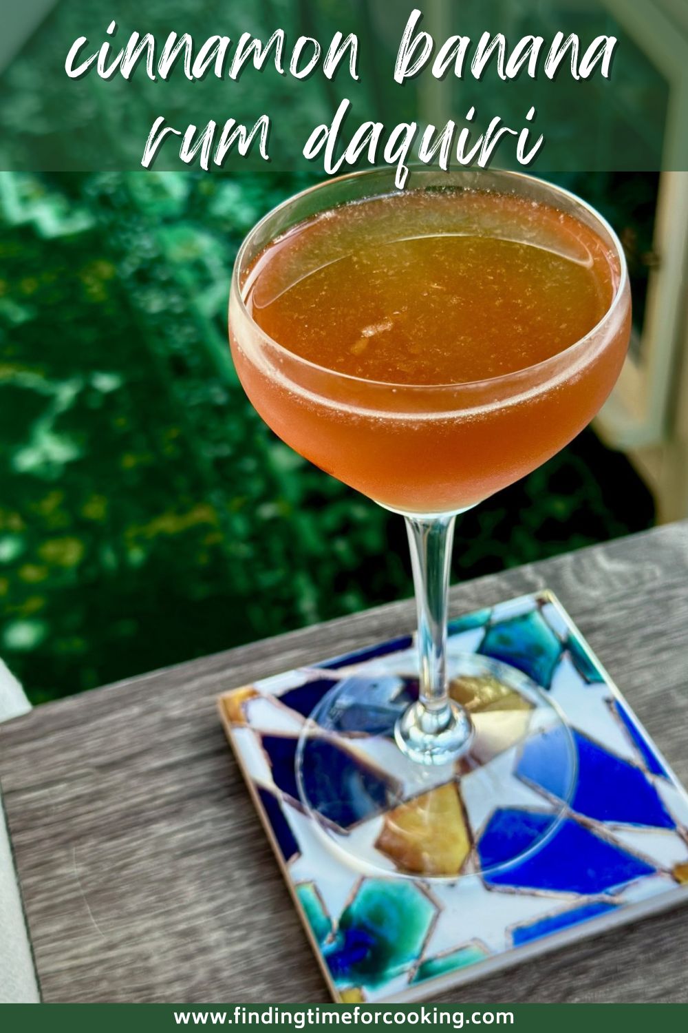 Spiced Banana Daquiri Rum Cocktail | This cinnamon banana daquiri is based on the classic rum daquiri cocktail (shaken, not frozen), & the spiced syrup & banana liqueur elevates it! An easy yet fancy cocktail that brings a tropical vibe to the winter months. A great winter cocktail, but a rum cocktail or drink recipe for the rest of the year as well! A great use for banana liqueur. #daquiri #cocktailrecipe #drinkrecipe #rumcocktail 