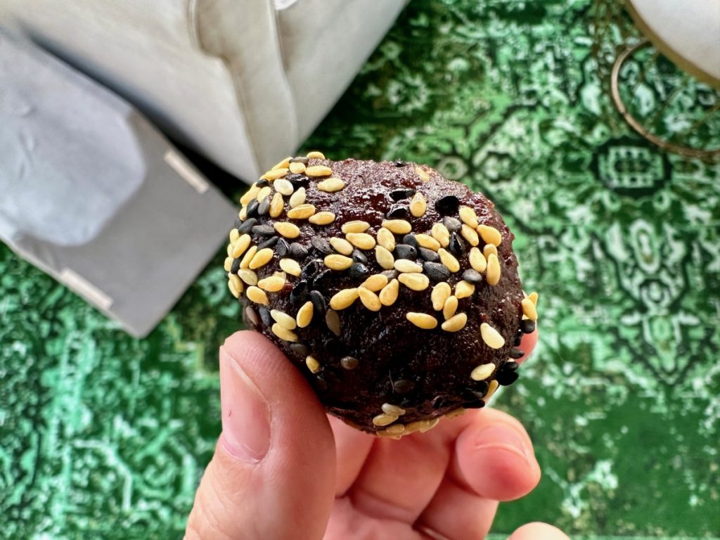 Healthy Dark Chocolate, Date, & Tahini Truffles | These healthy chocolate truffles are made of dates, tahini, & cocoa powder...a sweet treat that's super easy to make, naturaly gluten-free & dairy-free, as well as vegan.