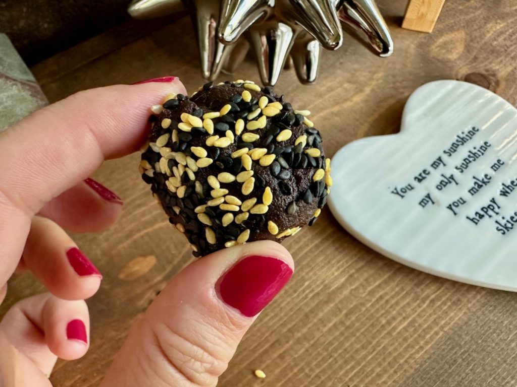 Healthy Dark Chocolate, Date, & Tahini Truffles | These healthy chocolate truffles are made of dates, tahini, & cocoa powder...a sweet treat that's super easy to make, naturaly gluten-free & dairy-free, as well as vegan.