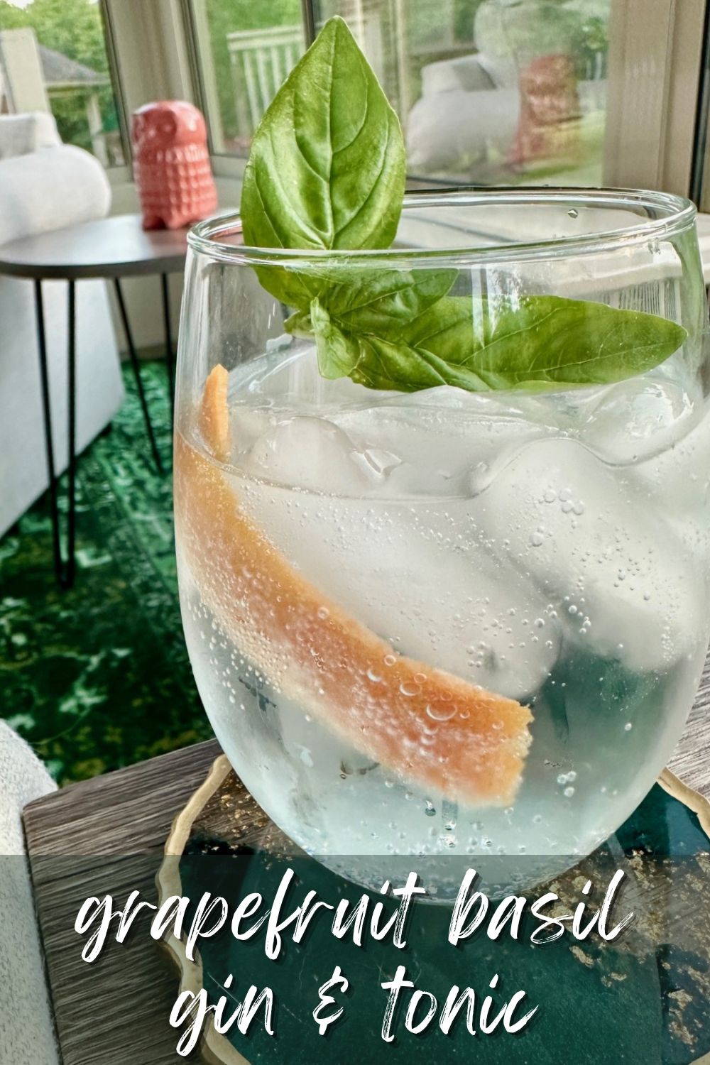 How to Make a Grapefruit Basil Gin & Tonic | Forget your boring gin & tonic with lime and whip up this refreshing grapefruit basil gin & tonic! This is the easy summer cocktail you need in your life, an easy summer drink recipe for any occasion, with citrus & herbal notes. #easydrinks #easycocktail #summerdrink #drinkrecipes #gintonic