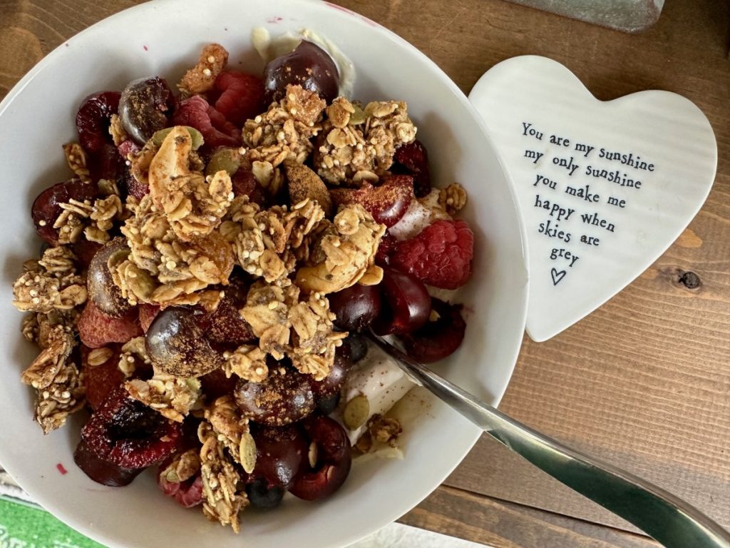 This delicious spiced orange honey granola is practically a superfood! It's high in protein & fiber, packed with nutrients, low in sugar, & SO easy to make.