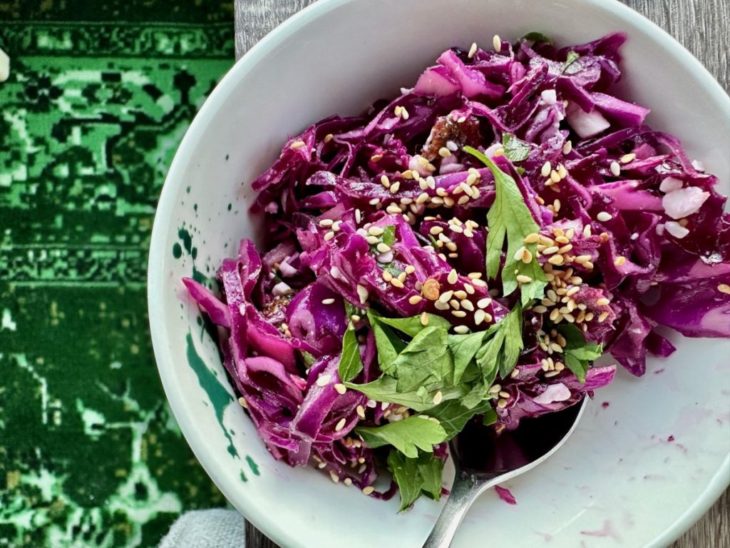 This unique red cabbage, feta, & date salad is vibrant and delicious, an easy, healthy side dish that's perfect for any occasion