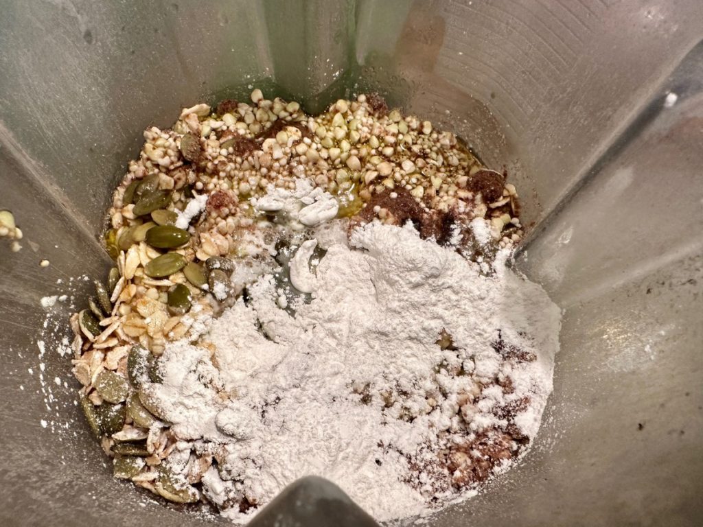 blending the ingredients to make a super healthy gluten-free buckwheat, quinoa, & oat bread