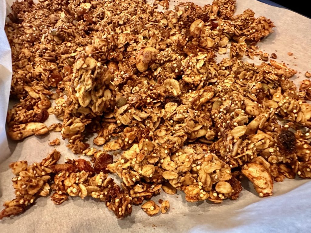 This delicious spiced orange honey granola is practically a superfood! It's high in protein & fiber, packed with nutrients, low in sugar, & SO easy to make.