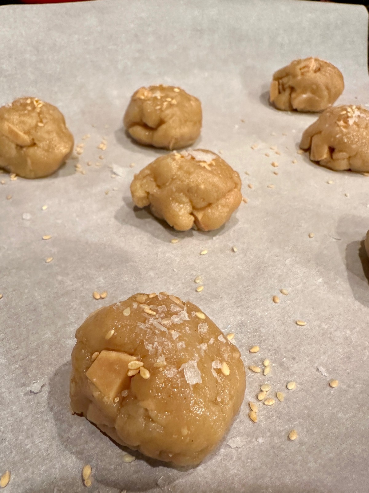These sesame, tahini, and caramelized white chocolate cookies have a subtle and intriguing flavor.