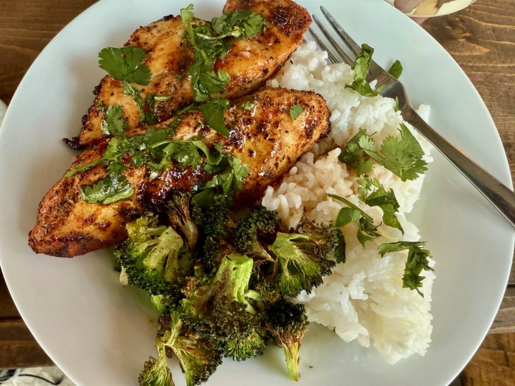 Hot Honey Lime Chicken with Coconut Rice | This honey lime cilantro chicken is super easy and SO delicious, a perfect 30-minute meal.  The chicken and sauce are packed with flavor, and it pairs perfectly with an easy coconut rice.  It makes great leftovers as well!  