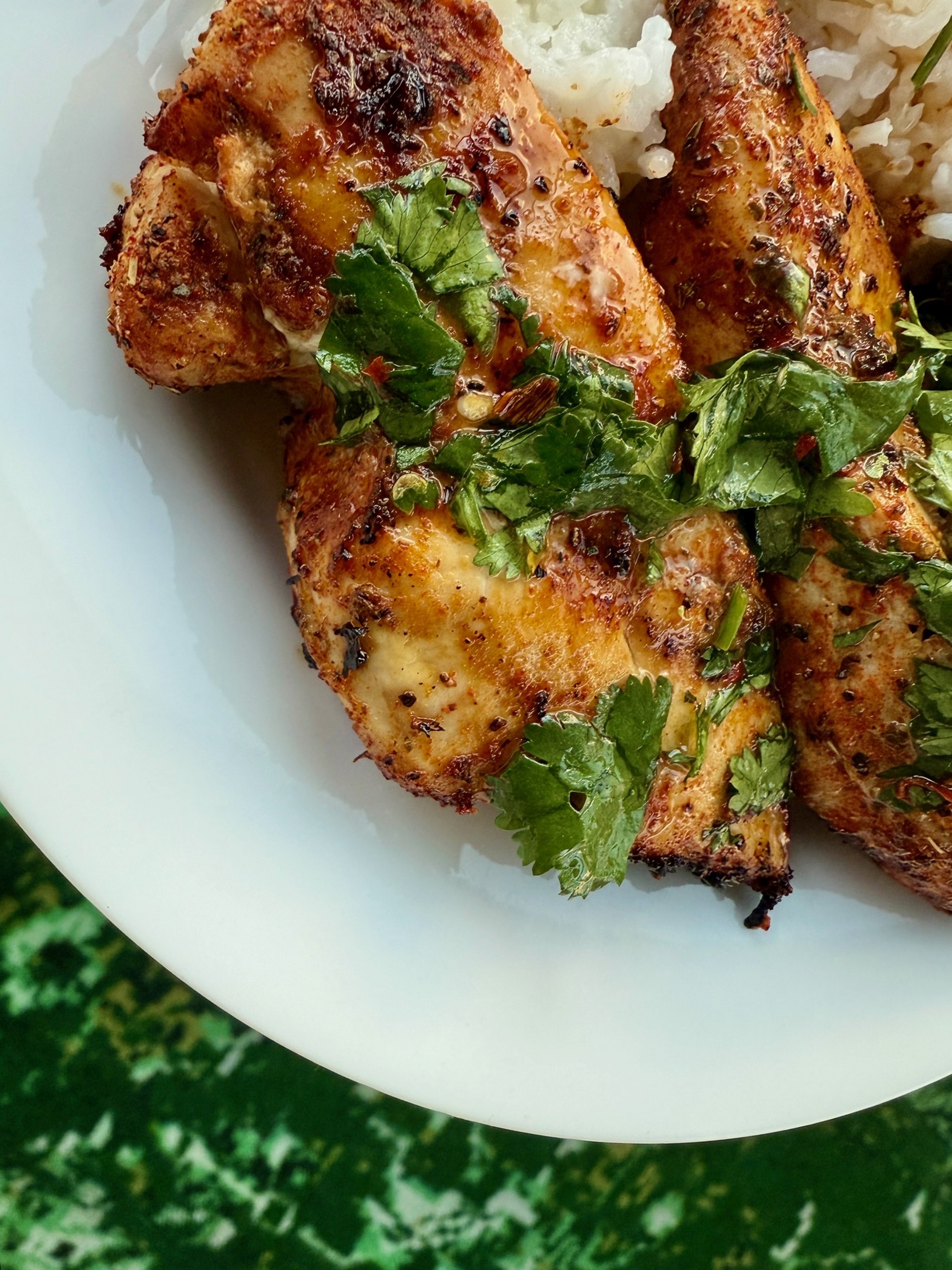 Hot Honey Lime Chicken with Coconut Rice | This honey lime cilantro chicken is super easy and SO delicious, a perfect 30-minute meal.  The chicken and sauce are packed with flavor, and it pairs perfectly with an easy coconut rice.  It makes great leftovers as well!  This is a great weeknight meal, air fryer meal, fast & healthy dinner recipe. #weeknight #healthydinner #chickenrecipe 