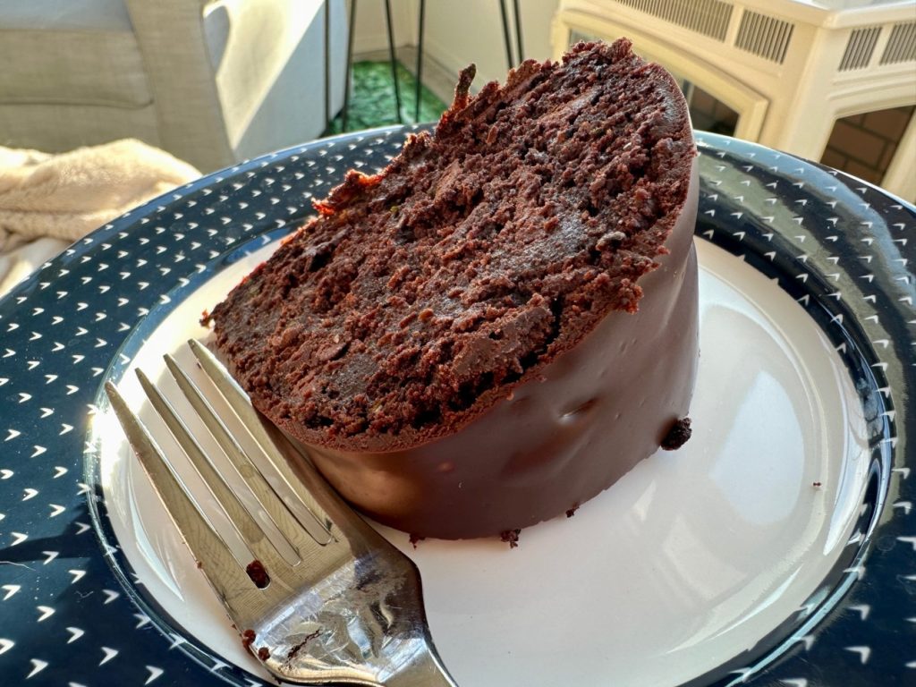 slice of chocolate zucchini cake on a plate