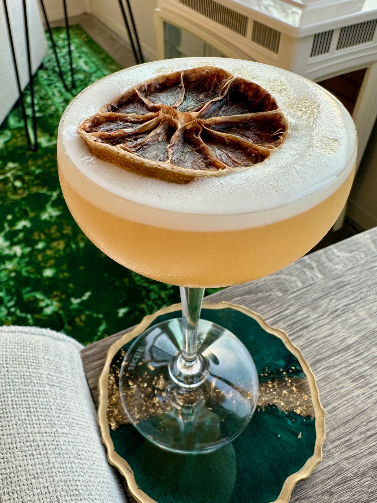 "Mayan Sour": A Delicious Spiced Banana Whiskey Sour | This subtle, refreshing spiced banana whiskey sour cocktail is absolutely delicious! It relies on banana-infused bourbon, which is super easy to make and really elevates the flavors in this cocktail. Try this twist on a classic whiskey sour cocktail, how to make infused bourbon! Easy cocktail recipes, how to make a whiskey sour.