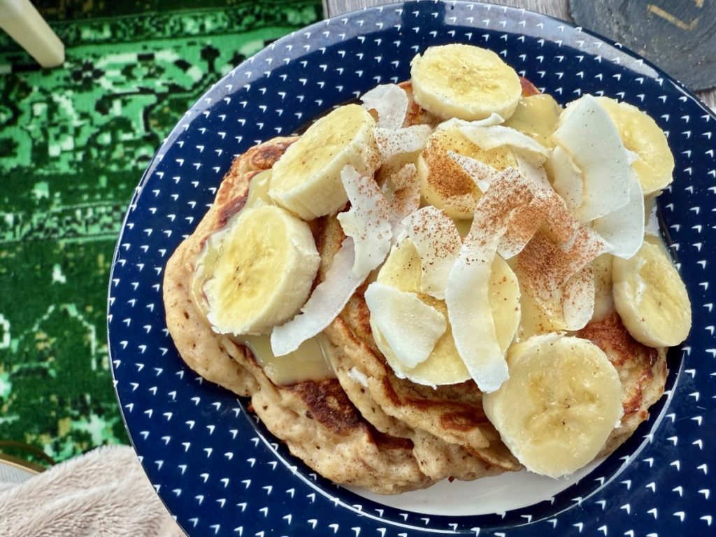 These easy coconut banana pancakes have a delightful tropical vibe, & are dairy-free