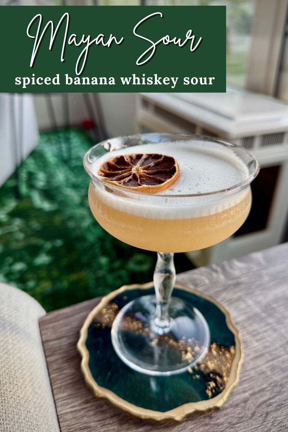 "Mayan Sour": A Delicious Spiced Banana Whiskey Sour | This subtle, refreshing spiced banana whiskey sour cocktail is absolutely delicious! It relies on banana-infused bourbon, which is super easy to make and really elevates the flavors in this cocktail. Try this twist on a classic whiskey sour cocktail, how to make infused bourbon! Easy cocktail recipes, how to make a whiskey sour. #whiskeysour #cocktailrecipes #cocktails #drinkrecipe