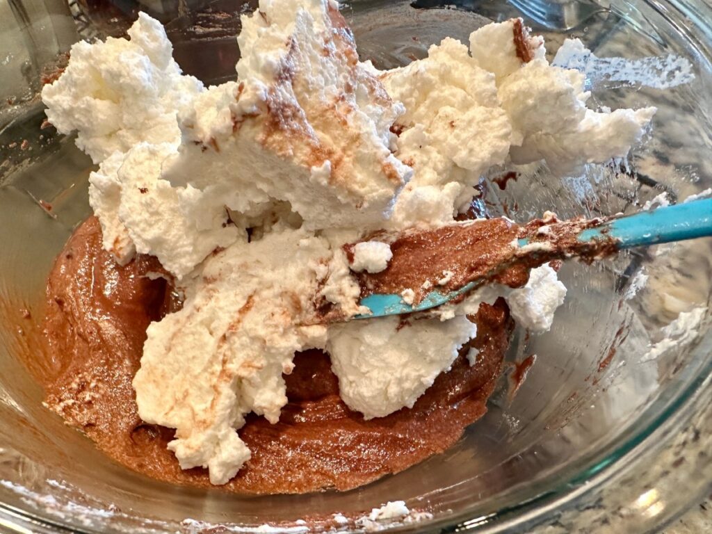 it's important to incorporate the whipped egg whites gently when making a chocolate souffle