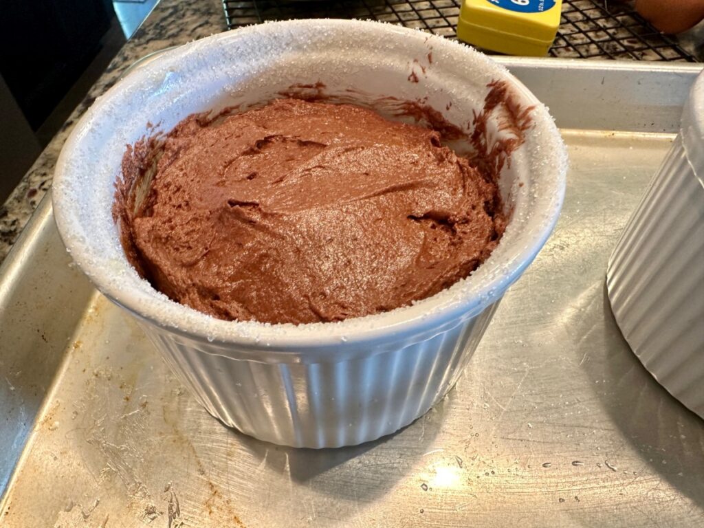 chocolate souffles ready to bake - I didn't use enough batter, make sure it comes up to the rim