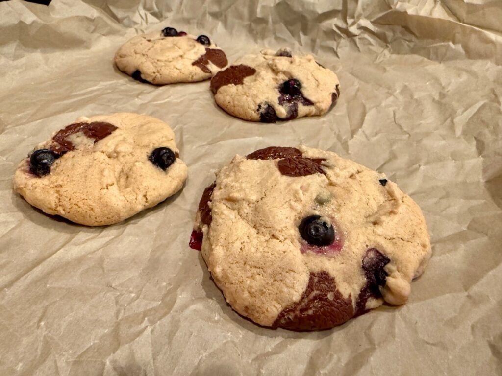 These blueberry dark chocolate chip cookies are the perfect summer cookie recipe, & can be either regular cookies or a skillet cookie!