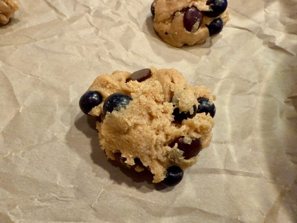These blueberry dark chocolate chip cookies are the perfect summer cookie recipe, & can be either regular cookies or a skillet cookie!