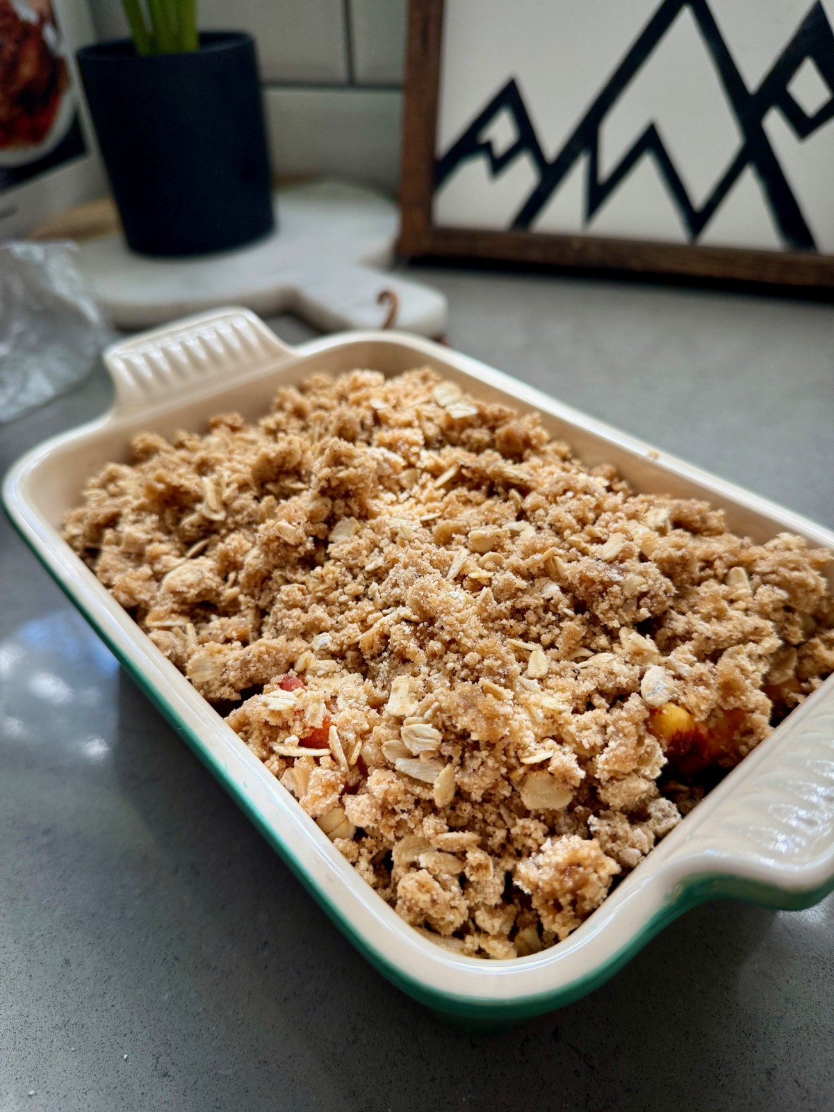 The Perfect Peach Crisp | This brown butter bourbon peach crisp is the ultimate version of this American classic, and a pure summer treat! All you need are delicious ripe peaches and only a few minutes of hands-on time. The is the best peach crisp out there.