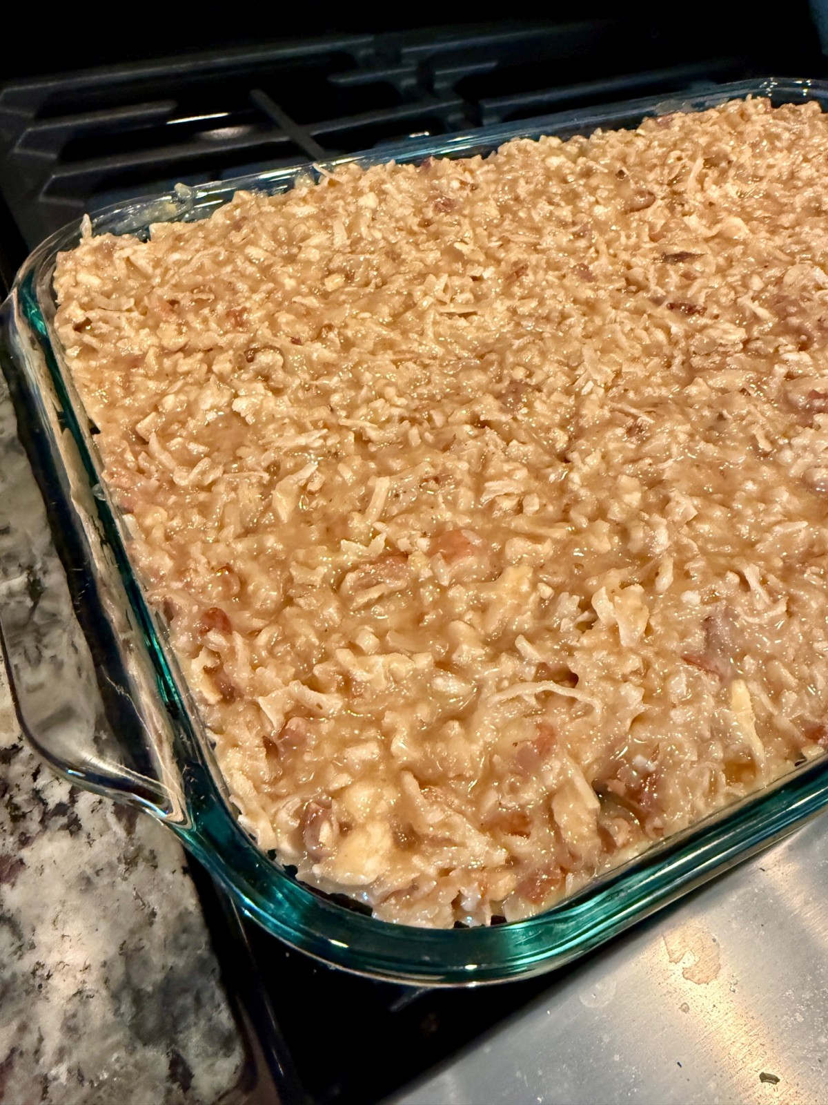 the coconut pecan caramel frosting is what makes a German chocolate cake so iconic