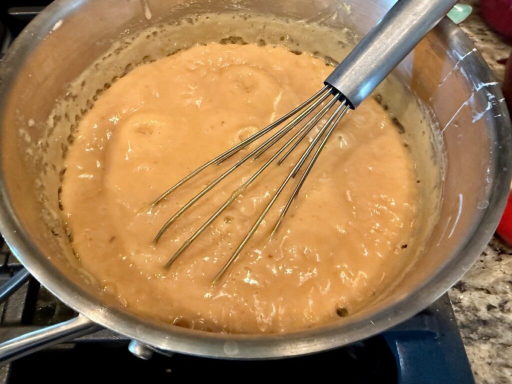 the coconut pecan caramel frosting is what makes a German chocolate cake so iconic