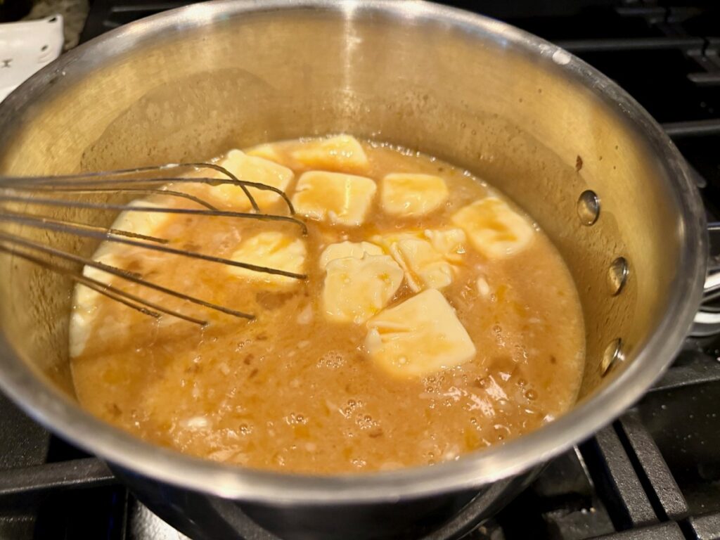 the coconut pecan caramel frosting is what makes a German chocolate cake so iconic