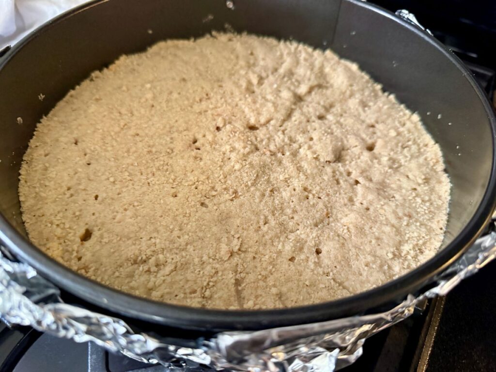 a macadamia shortbread crust is the perfect pairing with this pineapple cheesecake