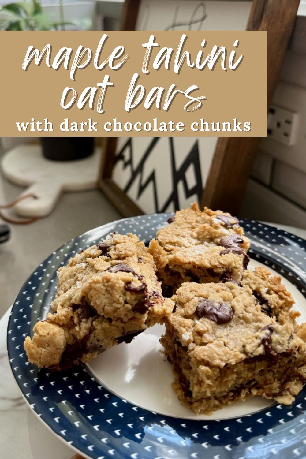 Tahini Maple Oat Bars with Dark Chocolate Chunks | These easy, healthy oat bars are packed with dark chocolate chunks and totally delicious despite being crazy healthy.  You can stir them together in just a couple minutes, and have an easy, healthy dessert ready to eat in less than an hour.  They also happen to be naturally gluten-free, dairy-free, and vegan. Perfect for a weeknight meal, healthy treat, or potluck dish. 
