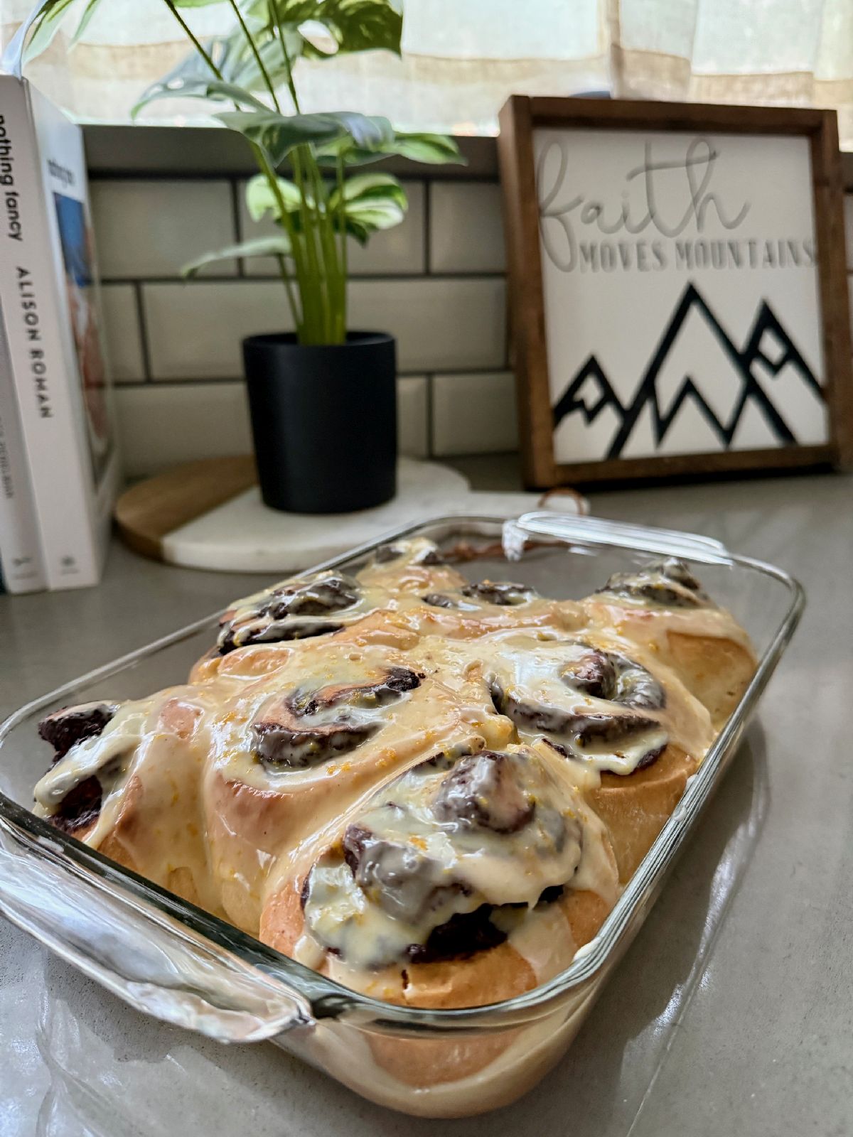 1-Hour(ish) Chocolate Cinnamon Rolls with Orange Glaze | These delicious chocolate rolls only take a bit over an hour to make, a perfect option when you need to pull together brunch or a baked good gift quickly. Rather than spending 4+ hours rising, rolling, and baking, these can be ready in just over an hour when you're pressed for time, and they're absolutely delicious! Drizzle with an easy fresh orange flavored glaze, and you've got a winner.