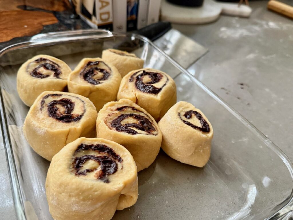 These delicious 1-hour (ish) chocolate cinnamon rolls with orange glaze are super fast to make