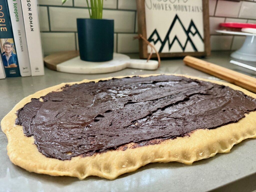 These delicious 1-hour (ish) chocolate cinnamon rolls with orange glaze are super fast to make