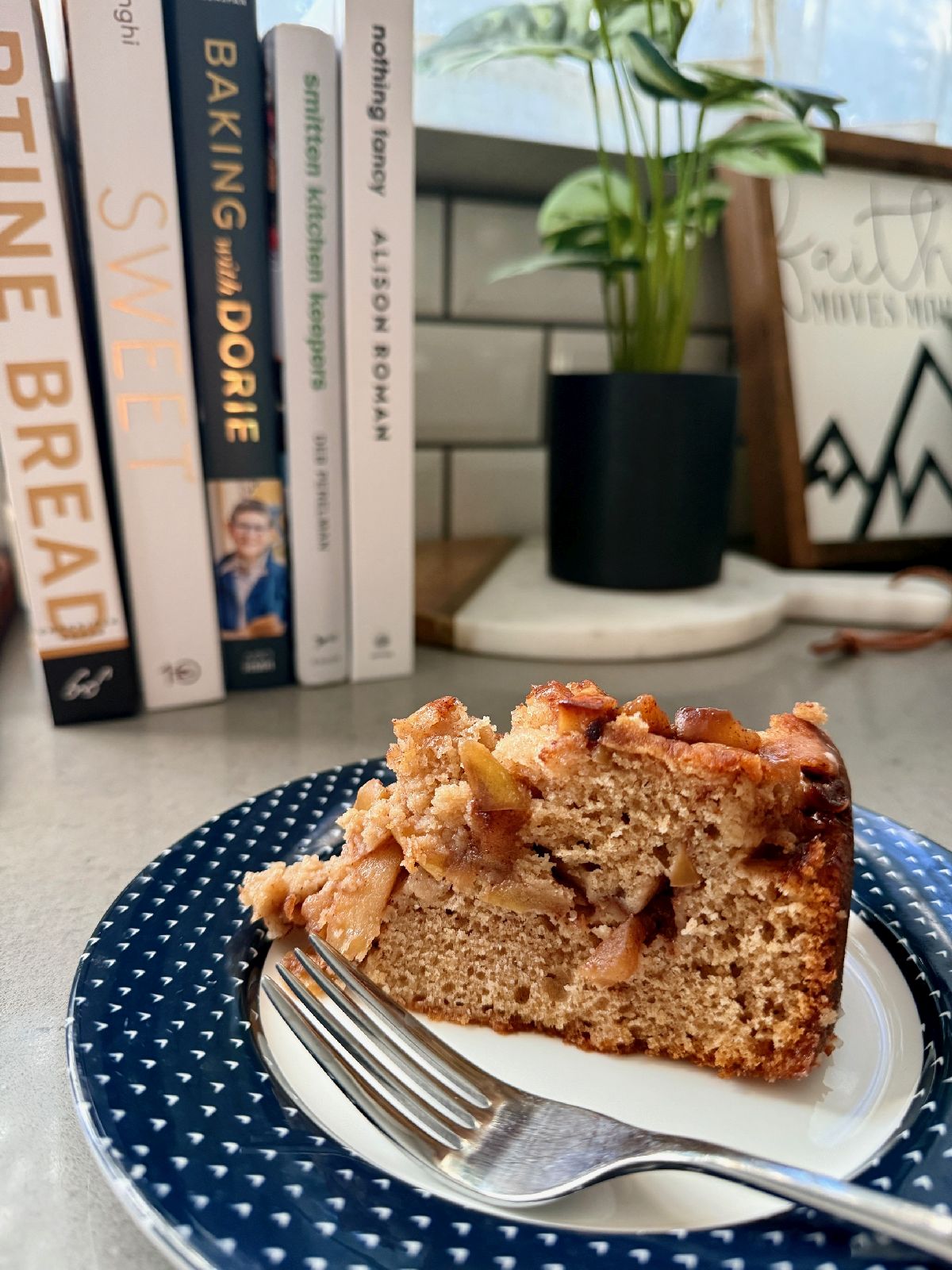 Caramelized Apple "Snack Cake" | This delicious caramelized apple cake is not just a fall treat, but the perfect indulgent snack year-round! Featuring a warmly spiced batter layered with gooey caramelized apples and topped with an apple cider glaze for a simple and cozy "snacking cake" that pairs perfectly with a cup of coffee on a Tuesday morning.  