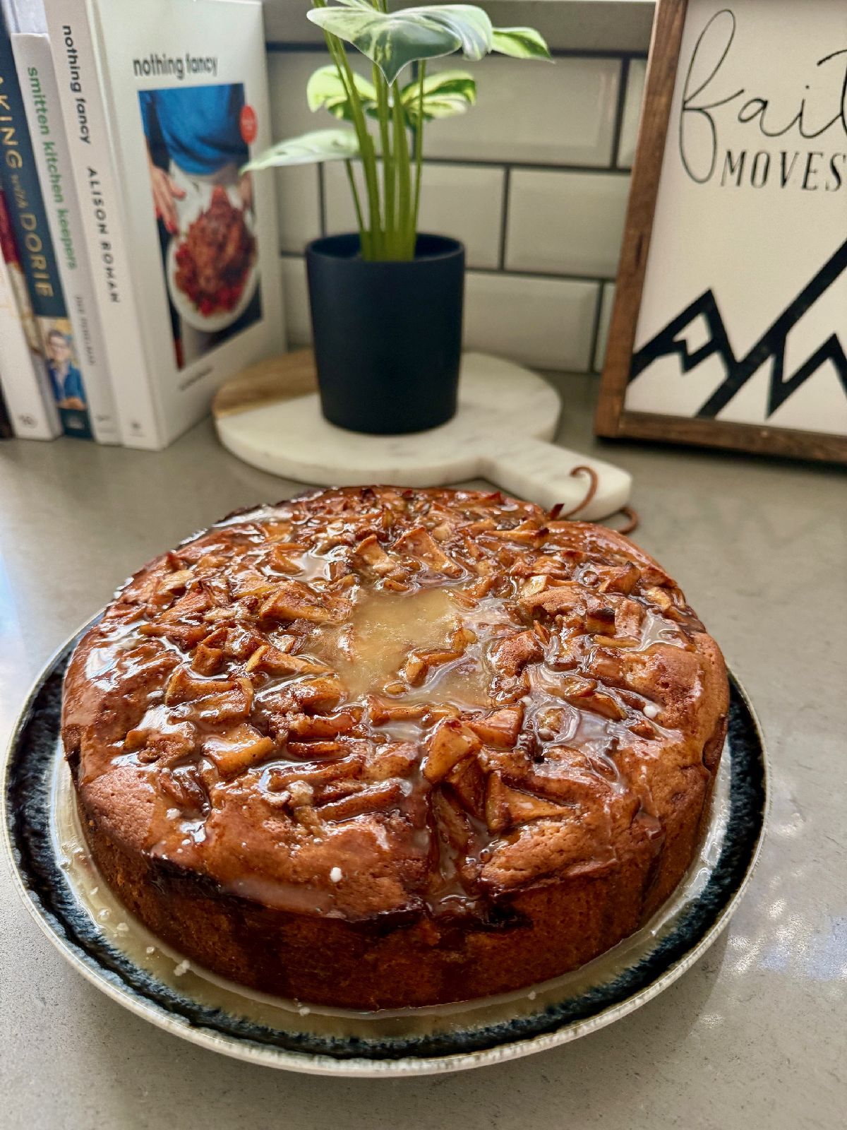Caramelized Apple "Snack Cake" | This delicious caramelized apple cake is not just a fall treat, but the perfect indulgent snack year-round! Featuring a warmly spiced batter layered with gooey caramelized apples and topped with an apple cider glaze for a simple and cozy "snacking cake" that pairs perfectly with a cup of coffee on a Tuesday morning.  