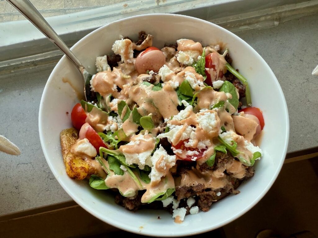 Healthy Loaded Cheeseburger Bowls with Smashed Potatoes | These healthy cheeseburger bowls are a super easy weeknight meal that's flexible for all types of tastes and dietary restrictions.  You can whip it up in a very short time (especially if you boil the potatoes ahead and keep them in the fridge), and it feels indulgent while being packed with nutrients. 