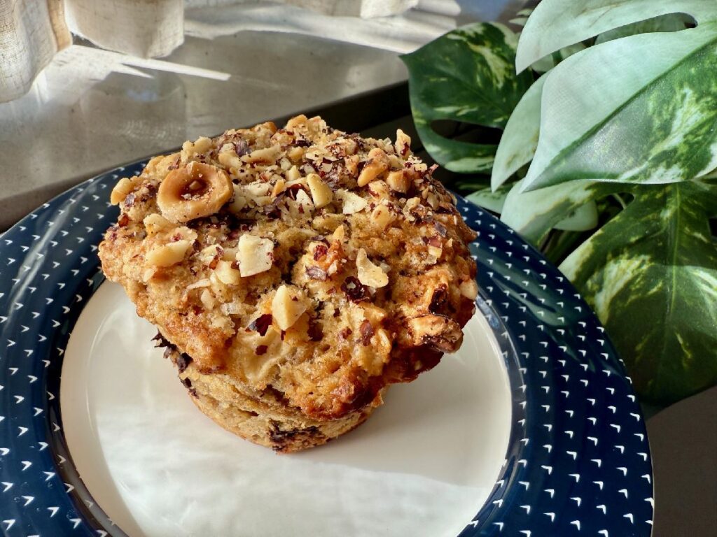 These spiced pear, hazelnut, and dark chocolate muffins are packed with warm spices and fun textures...a cozy hug whether it's a breakfast treat or an afternoon snack!  One of the best muffin recipes for fall and winter.