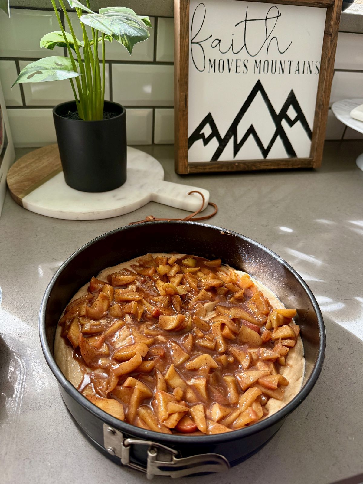 Caramelized Apple "Snack Cake" | This delicious caramelized apple cake is not just a fall treat, but the perfect indulgent snack year-round! Featuring a warmly spiced batter layered with gooey caramelized apples and topped with an apple cider glaze for a simple and cozy "snacking cake" that pairs perfectly with a cup of coffee on a Tuesday morning.  Fall dessert recipes, afternoon tea recipes, apple recipes. #fall #applecake #snackcake