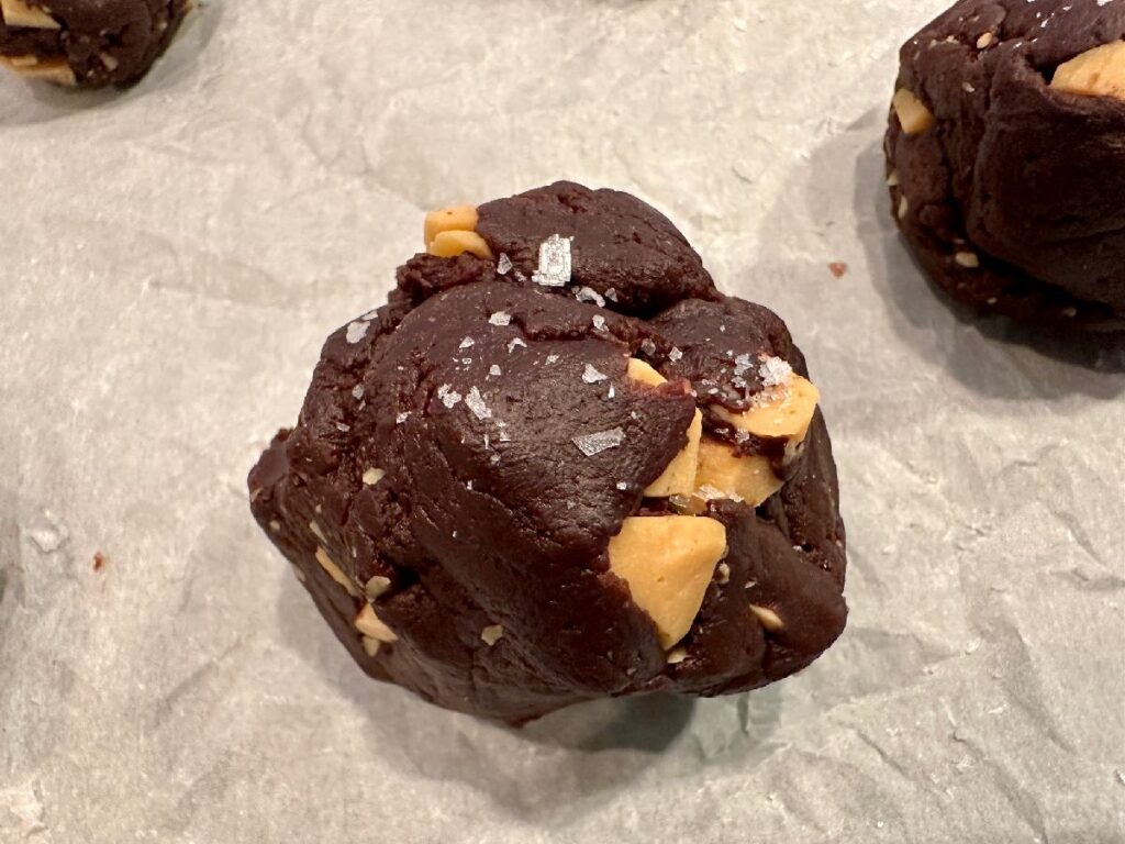 These dark chocolate cookies with caramelized white chocolate are a unique twist on a classic...rich, luscious, but not sickly sweet, they're perfect for the "indulgent cookie lover" in your life! What to make with caramelized white chocolate.