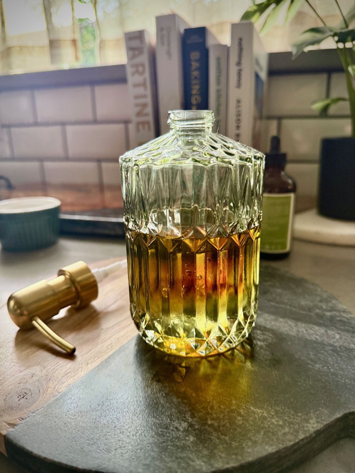 How to Make Clean, Moisturizing Body Oil | If you've been making healthy non-toxic beauty product swaps, this DIY homemade body oil recipe is super healthy, makes your skin feel amazing, & will save you money!  It's super easy to make, and much more cost-effective than buying it.  I've realized that body oil (on damp skin) is so much more moisturizing than lotion or body butter, especially for my 40+ year old skin! 