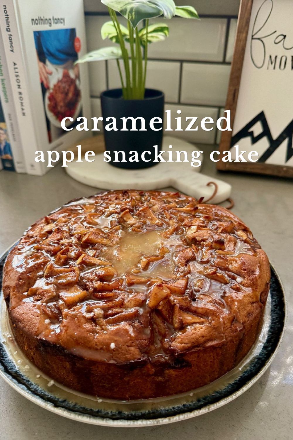 Caramelized Apple "Snack Cake" | This delicious caramelized apple cake is not just a fall treat, but the perfect indulgent snack year-round! Featuring a warmly spiced batter layered with gooey caramelized apples and topped with an apple cider glaze for a simple and cozy "snacking cake" that pairs perfectly with a cup of coffee on a Tuesday morning.  Fall dessert recipes, afternoon tea recipes, apple recipes. #fall #applecake #snackcake